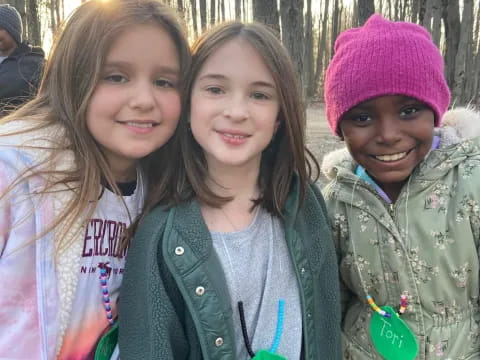 a group of girls smiling