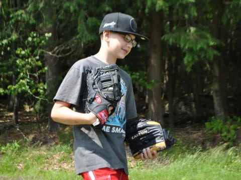 a person holding a baseball glove