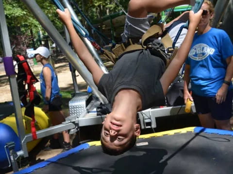 a woman lying on a swing