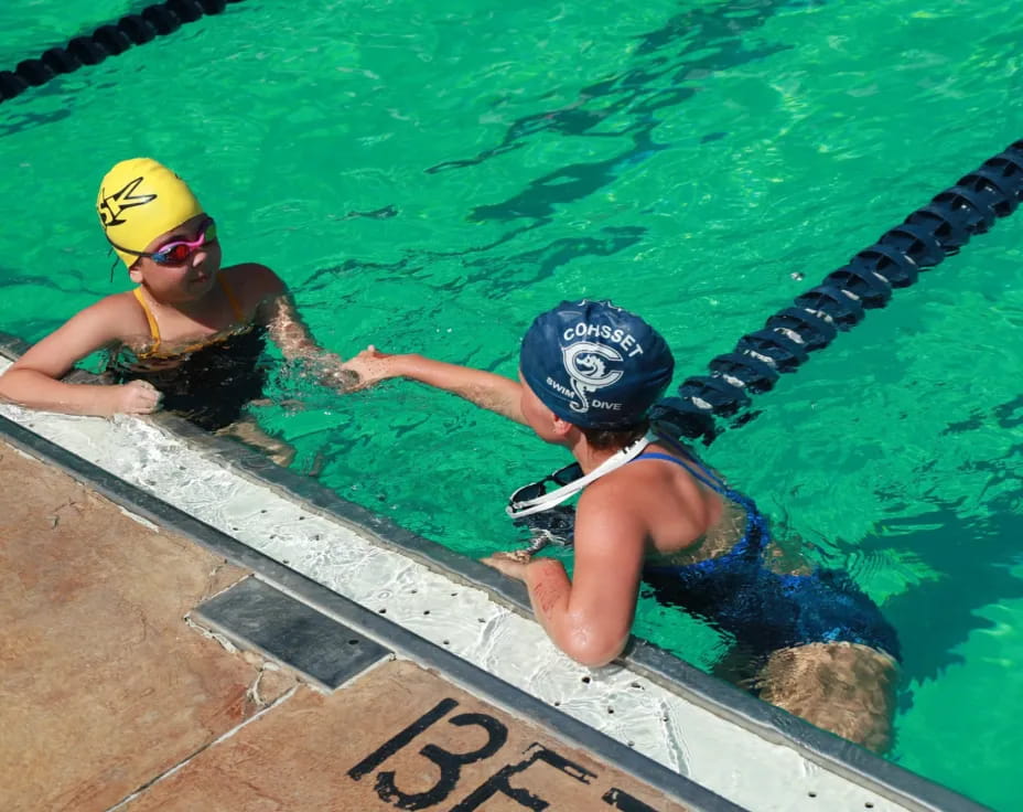 a couple of people in a pool