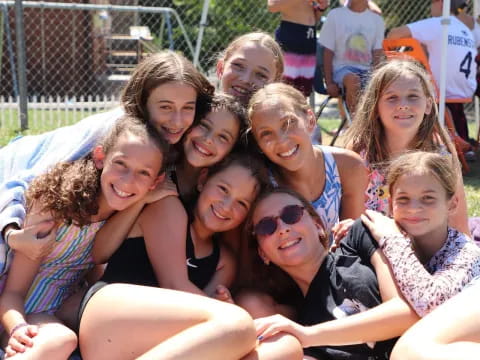 a group of women smiling