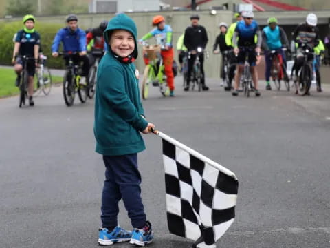 a boy holding a flag
