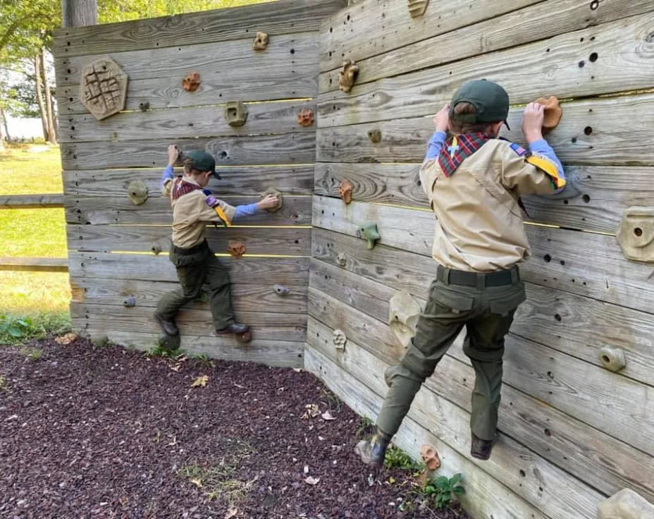 a couple of kids playing with a toy