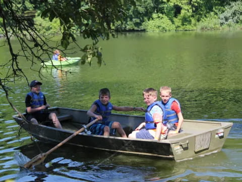 a group of people in a canoe