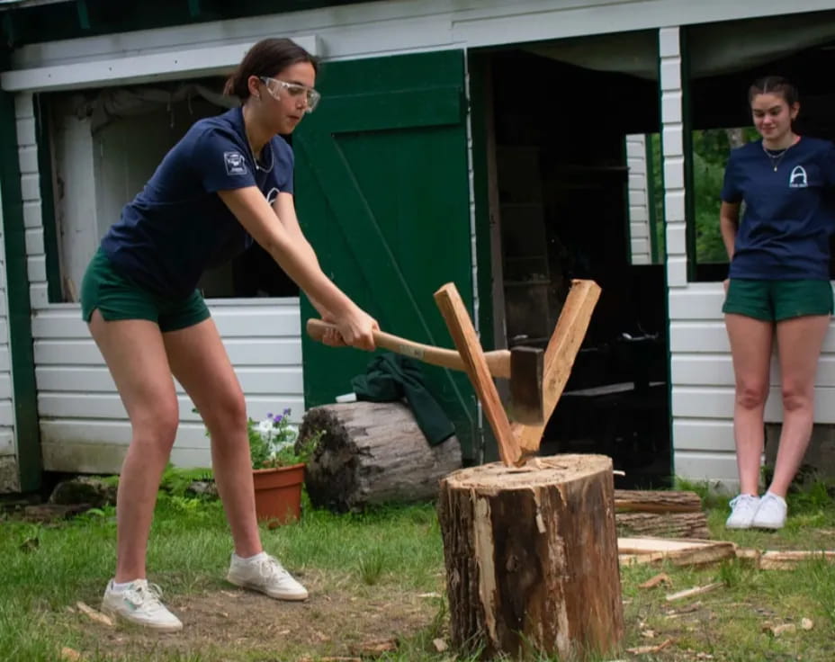 a person holding a stick