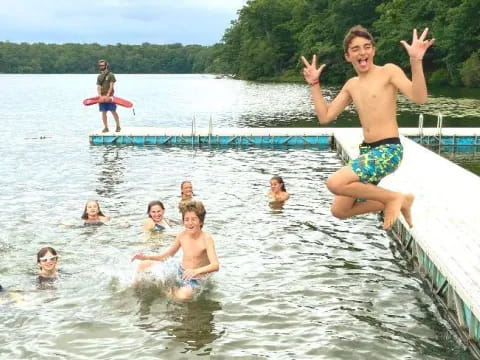 a group of people in a pool