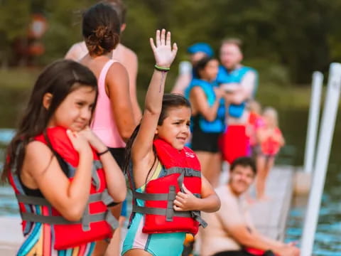 a group of people in life jackets
