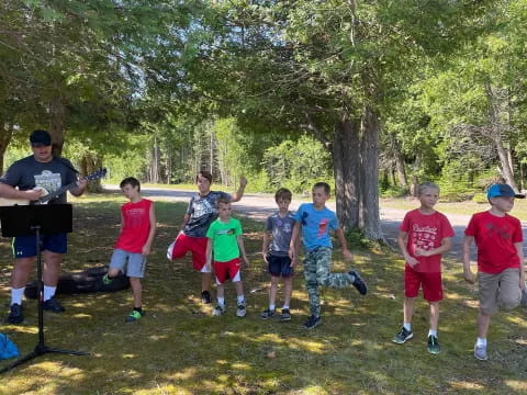 a group of kids playing football