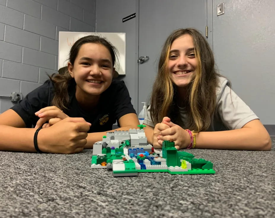 a couple of girls playing a game