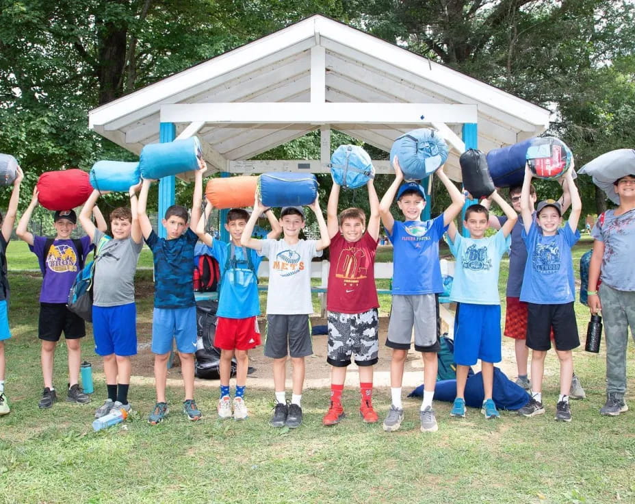 a group of kids posing for a photo