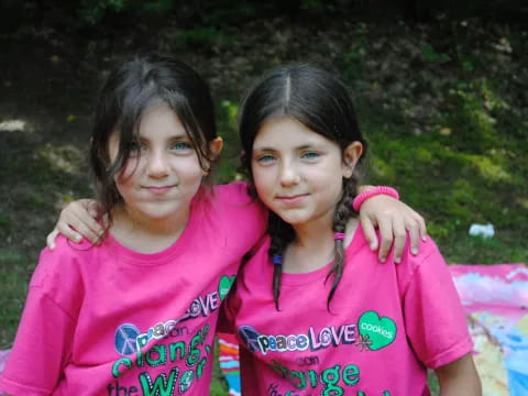 two girls posing for a picture