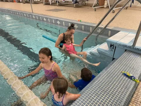 a group of people in a pool