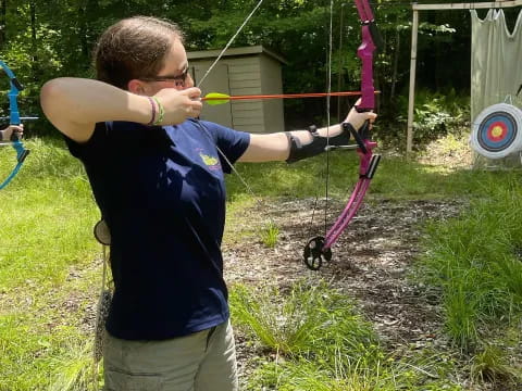 a man holding a bow and arrow