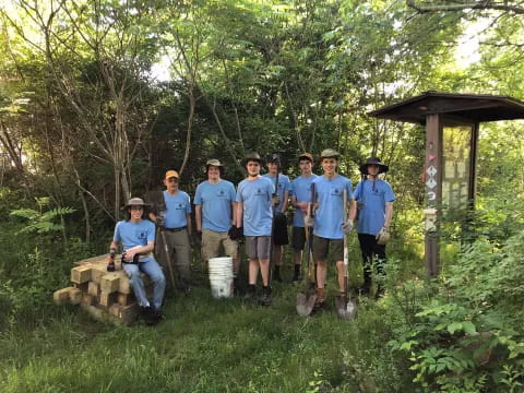 a group of men standing outside