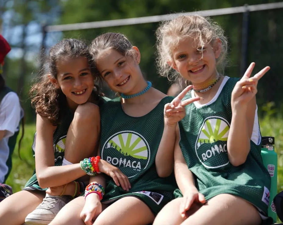 a group of girls posing for a picture