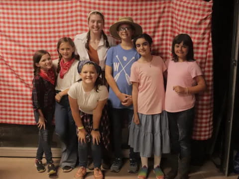 a group of people posing for a photo