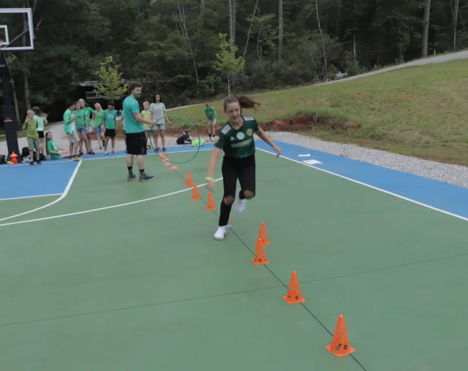 a group of people running on a track