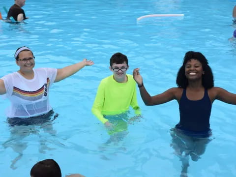 a group of people in a pool
