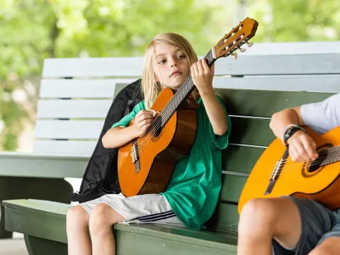 a woman playing a violin