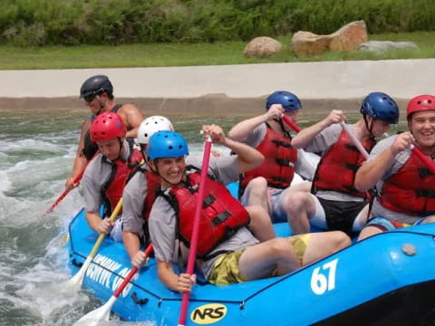 a group of people in a raft