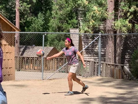 a man hitting a ball with his racket