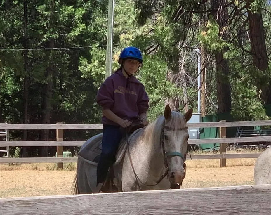 a man riding a horse