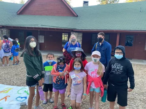 a group of people wearing masks
