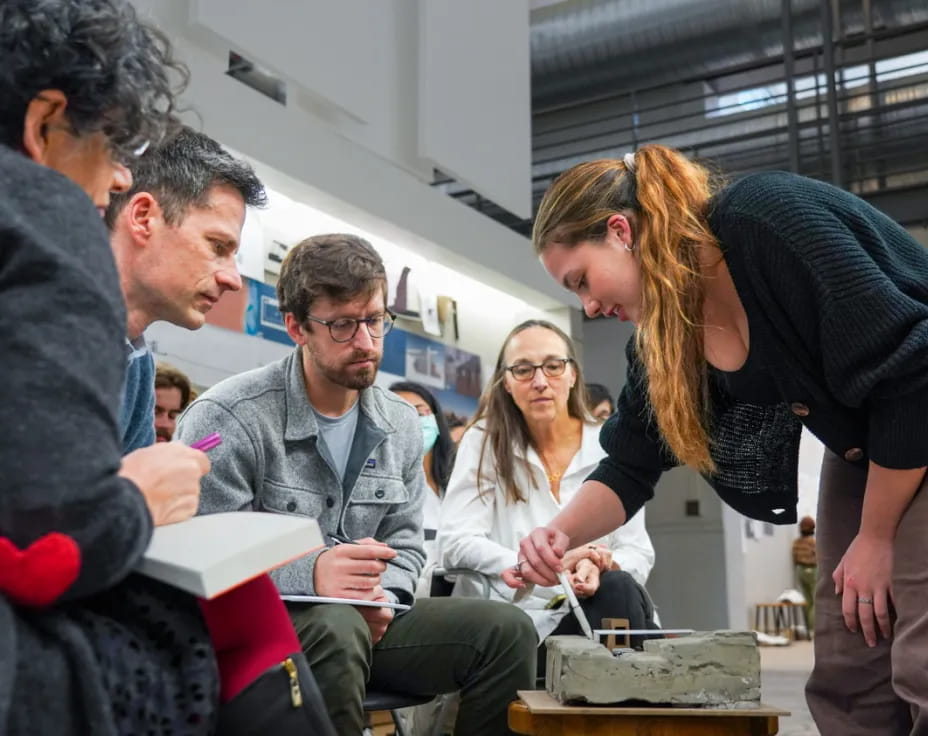 a group of people sitting in a room