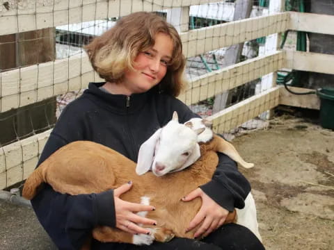 a person holding a dog