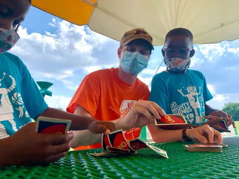 a group of people wearing masks