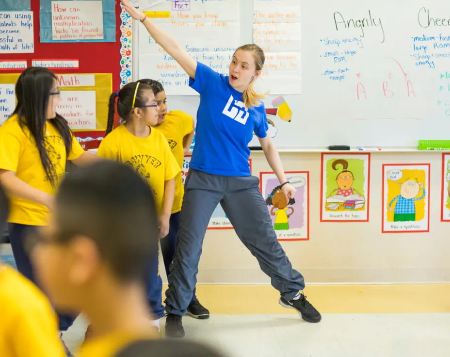 a girl in a blue shirt