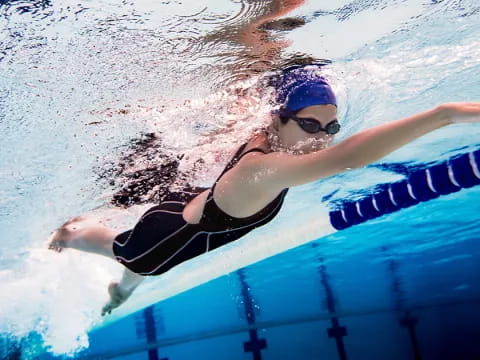 a person swimming in a pool