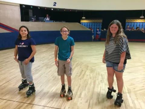 a group of people wearing roller skates