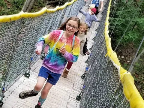 a person walking on a bridge