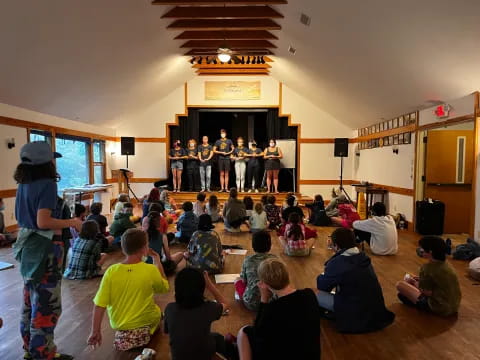 a group of people on a stage