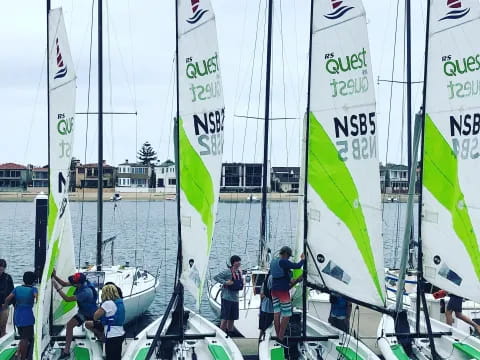 a group of people on a sailboat