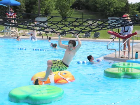 a group of people in a pool