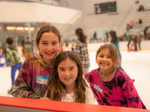 a group of girls smiling
