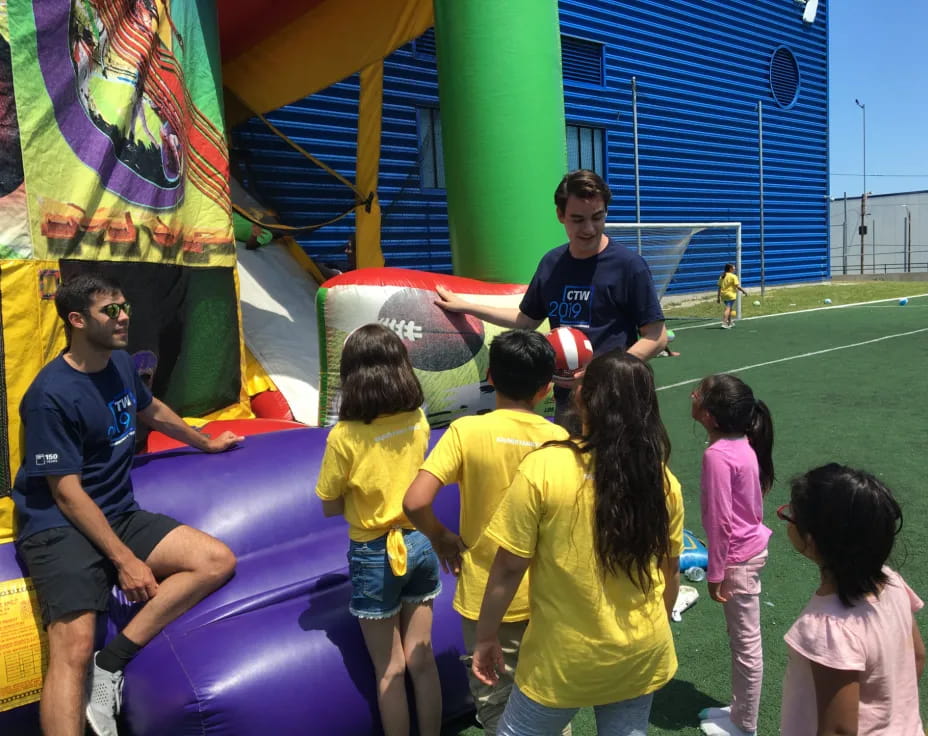 a group of people playing football