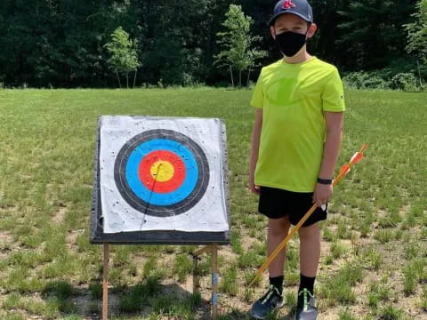 a man holding a paintball