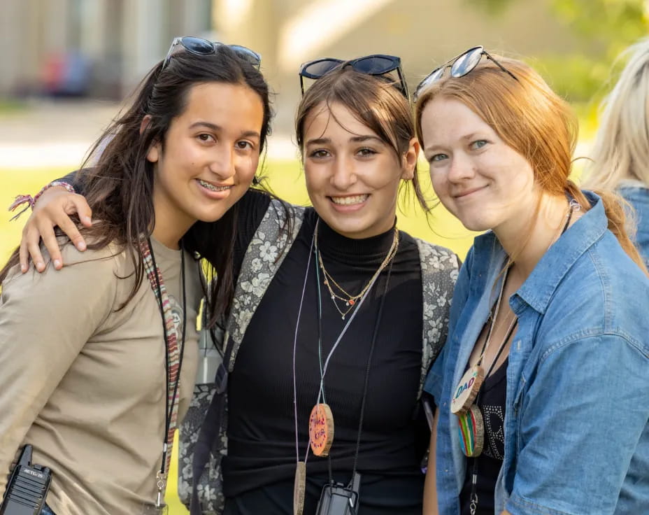 a group of women smiling