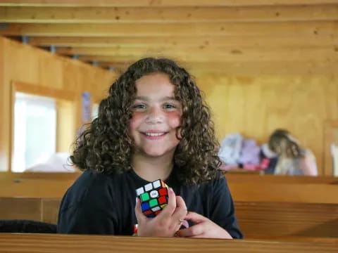 a girl with curly hair