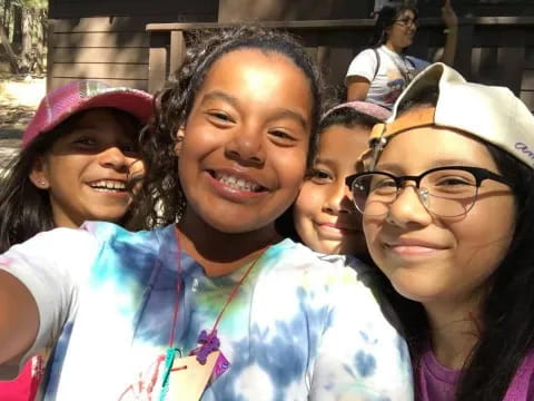 a group of girls smiling