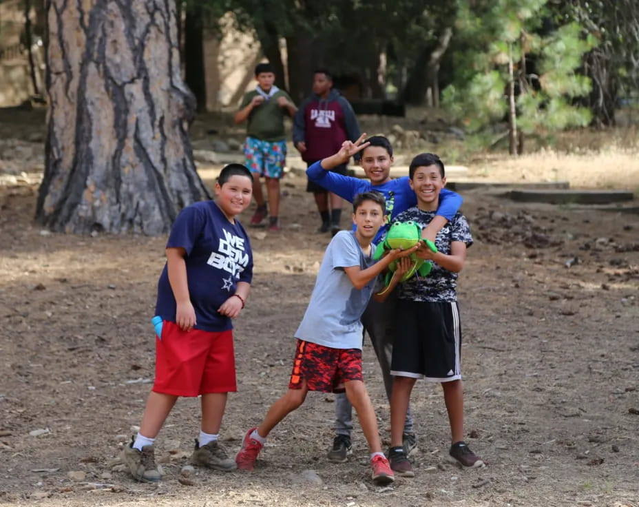 a group of boys holding a ball