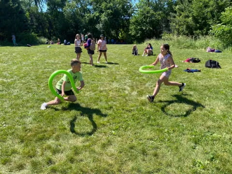 kids playing with frisbees