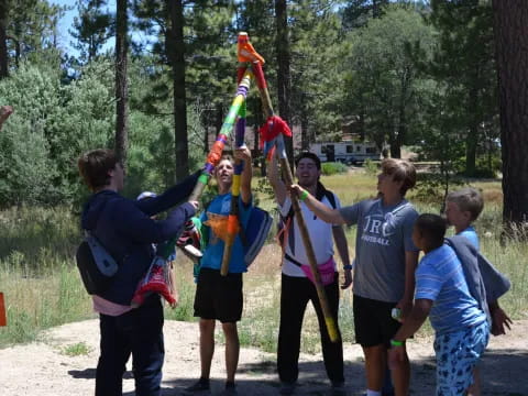 a group of people holding a flag