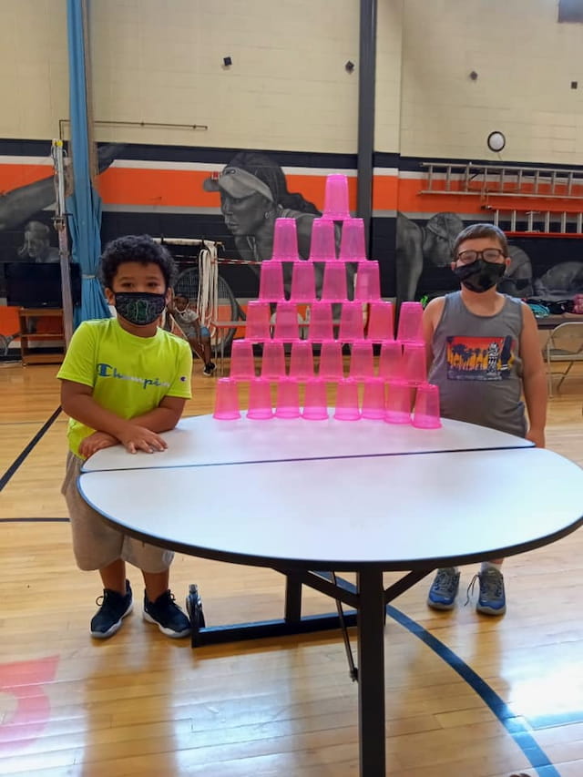 a group of people wearing masks