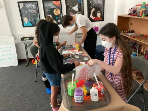 a group of people wearing masks