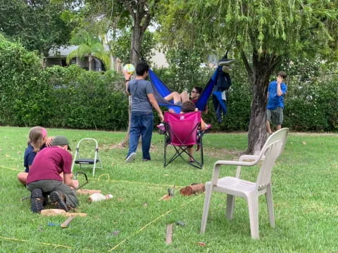 a group of people with dogs