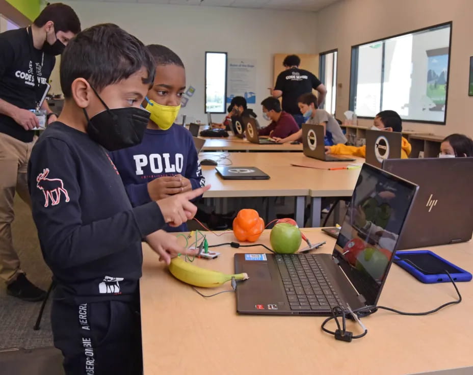 a group of kids in a classroom